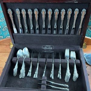 Sterling Silver 6 piece place settings by Lunt